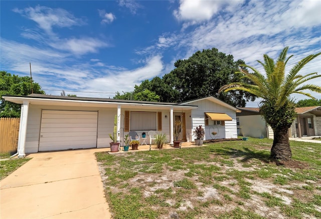 single story home featuring a garage