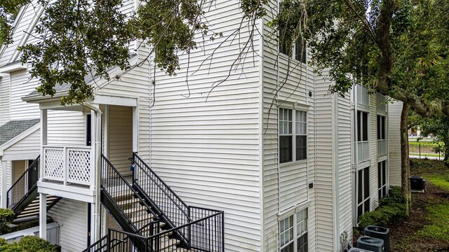 view of home's exterior with central AC