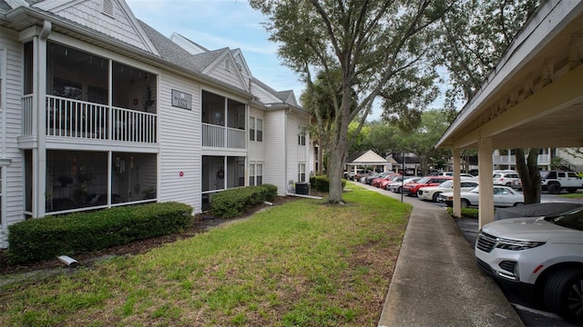 view of home's community featuring a yard