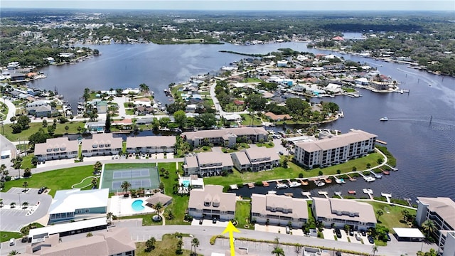 birds eye view of property with a water view