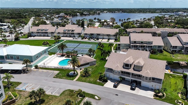 birds eye view of property featuring a water view