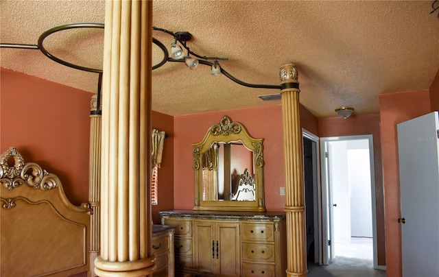 interior space featuring a textured ceiling