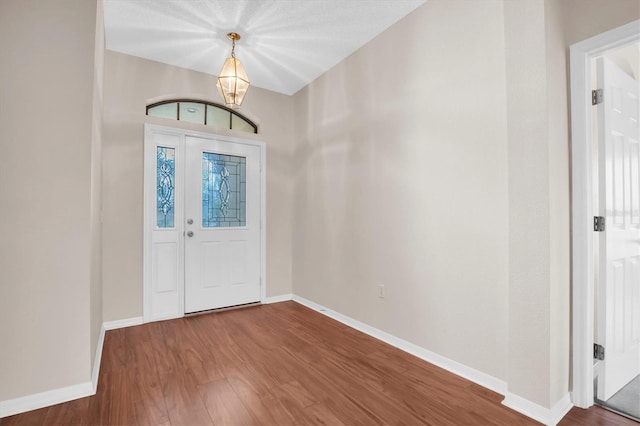 foyer with hardwood / wood-style floors