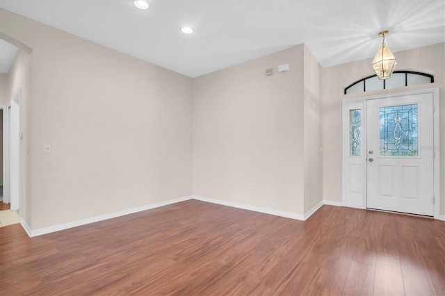 entrance foyer featuring hardwood / wood-style floors