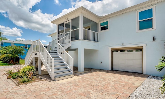 view of front of property with a garage