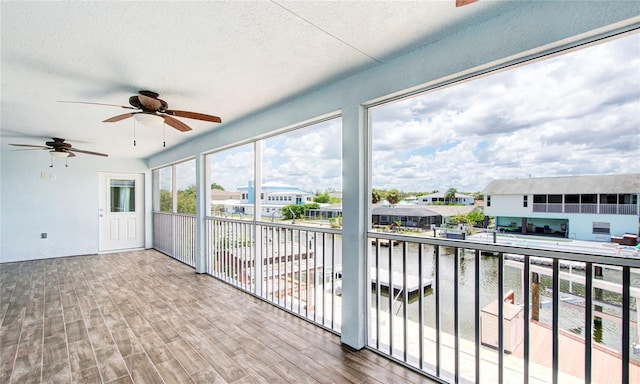 interior space featuring ceiling fan