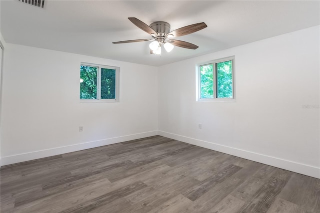 empty room with wood-type flooring and ceiling fan