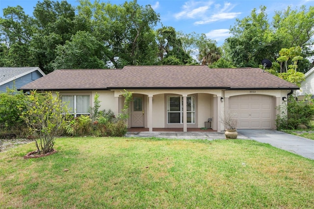 ranch-style home with a garage and a front yard