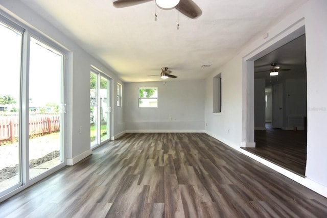 spare room featuring ceiling fan and wood-type flooring