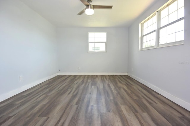 empty room with ceiling fan and hardwood / wood-style flooring