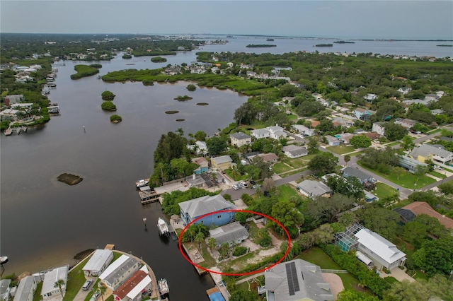 bird's eye view with a water view