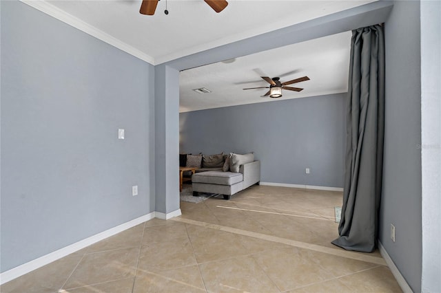 sitting room featuring ceiling fan, ornamental molding, and light tile patterned floors