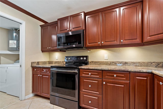 kitchen featuring stainless steel appliances, electric water heater, light stone counters, light tile patterned floors, and crown molding