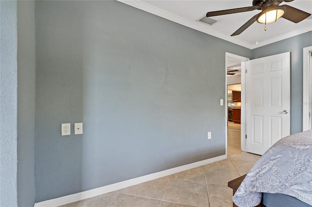 bedroom featuring light tile patterned flooring, ornamental molding, and ceiling fan