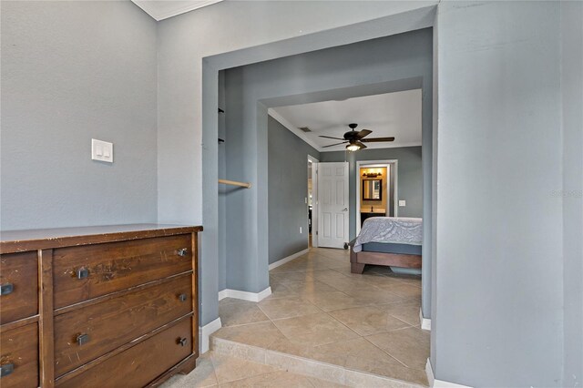 hallway with light tile patterned floors