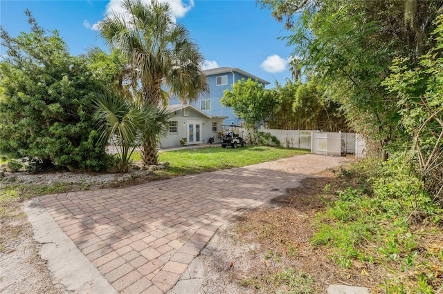 exterior space with a front lawn