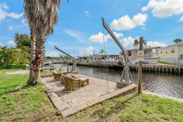 dock area featuring a water view