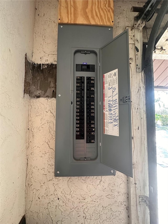 utility room with electric panel