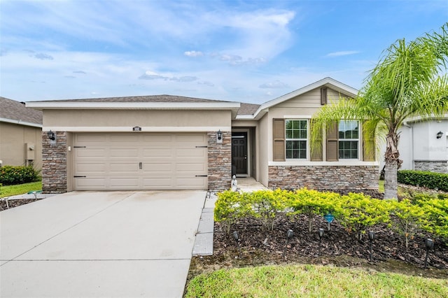 single story home featuring a garage