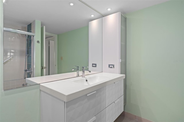 bathroom with vanity and tile patterned floors