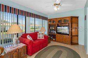 living room with ceiling fan