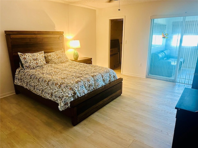 bedroom featuring light wood-type flooring