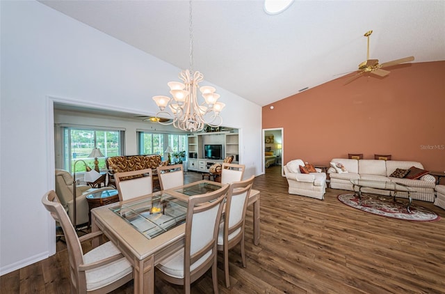 dining room featuring high vaulted ceiling, dark hardwood / wood-style floors, and ceiling fan with notable chandelier