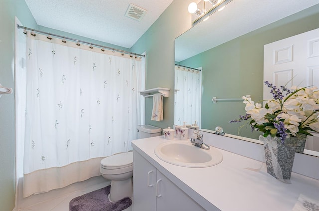 full bathroom with a textured ceiling, toilet, vanity, tile patterned floors, and shower / tub combo