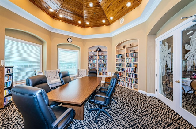 office space featuring a high ceiling, built in features, carpet flooring, french doors, and wood ceiling