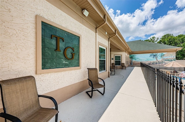 view of patio with a balcony