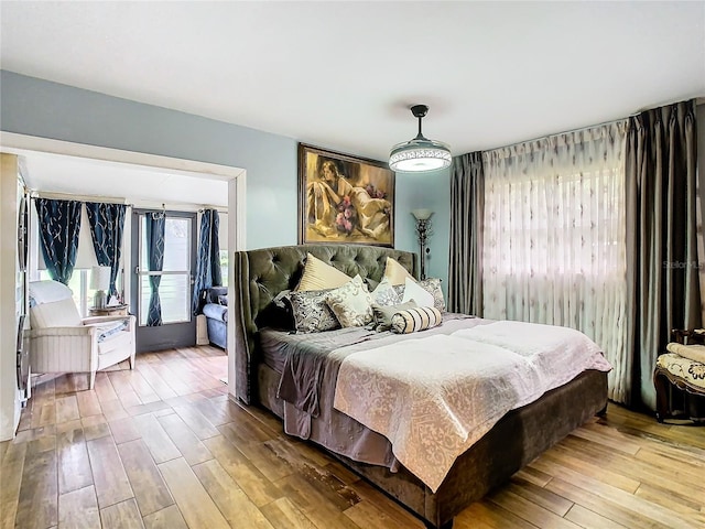 bedroom with hardwood / wood-style flooring