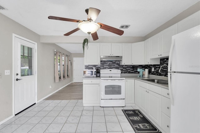 kitchen featuring ceiling fan, white cabinets, white appliances, sink, and light tile patterned floors