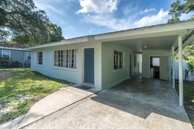 view of front of house with a carport