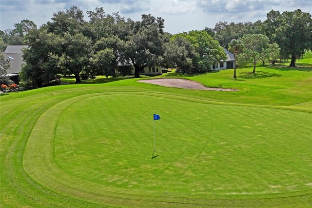 surrounding community featuring a lawn