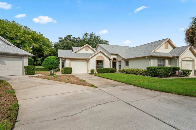 ranch-style home featuring a garage