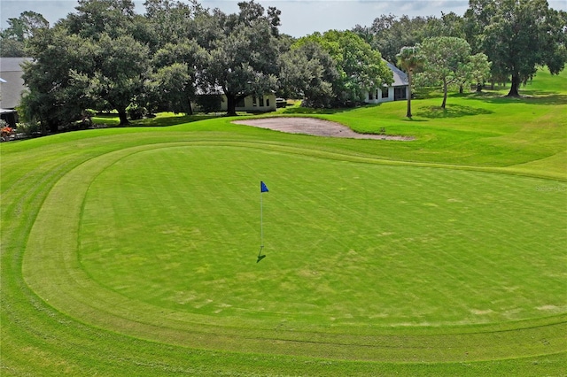 surrounding community with a lawn