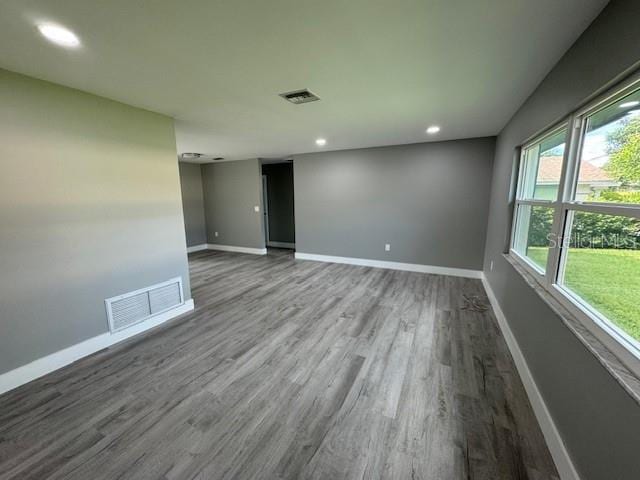 empty room featuring hardwood / wood-style flooring