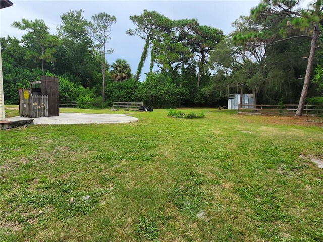 view of yard with fence