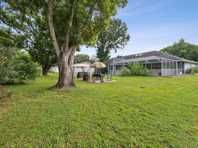 view of yard featuring a lanai