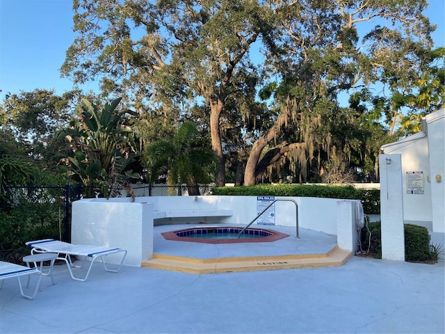 view of patio / terrace with a community hot tub