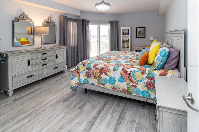 bedroom with light wood-type flooring