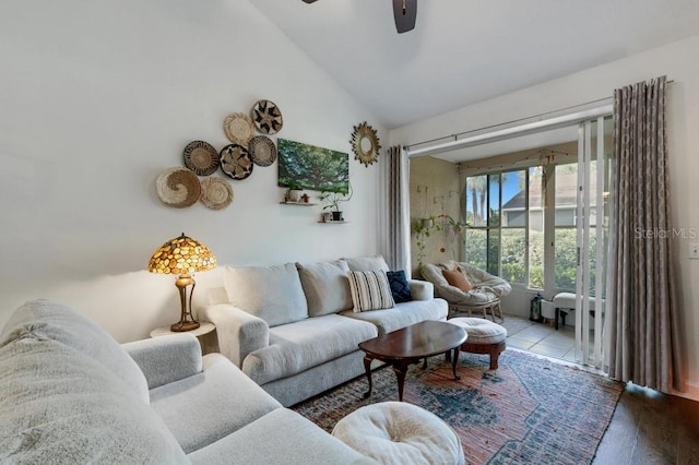 living room with wood-type flooring, high vaulted ceiling, and ceiling fan