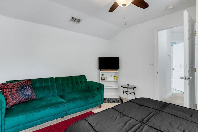 carpeted bedroom featuring vaulted ceiling and ceiling fan