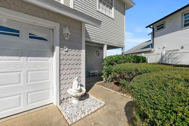 entrance to property featuring a garage