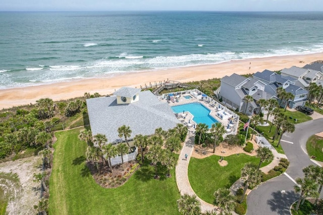 drone / aerial view with a view of the beach and a water view