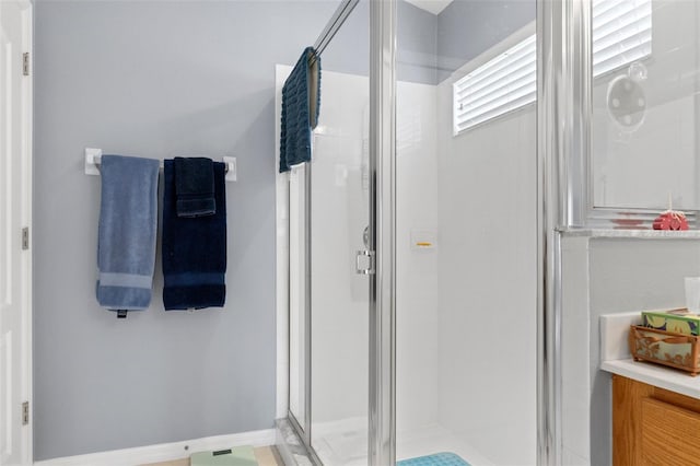 bathroom featuring an enclosed shower