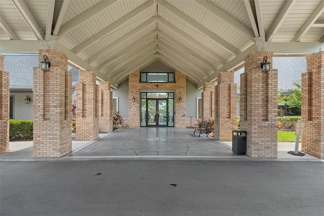 view of exterior entry featuring french doors