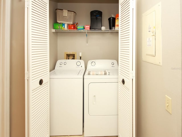 washroom featuring independent washer and dryer