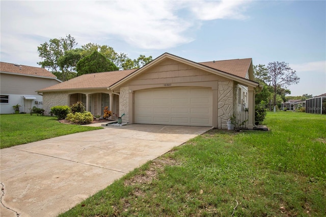 view of front of house with a garage and a front lawn