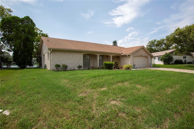 ranch-style house with a front lawn and a garage